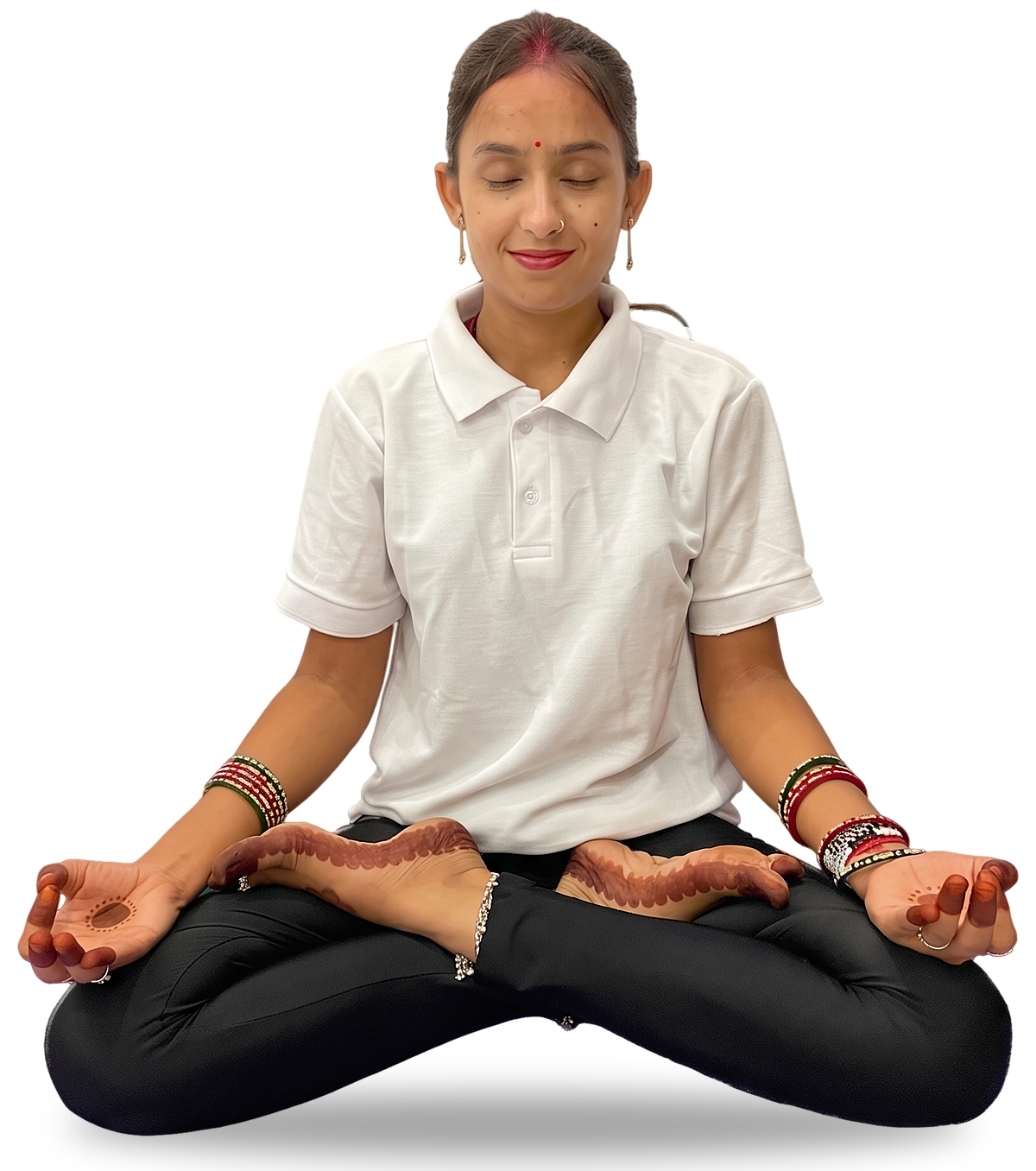 Latika meditating cross-legged